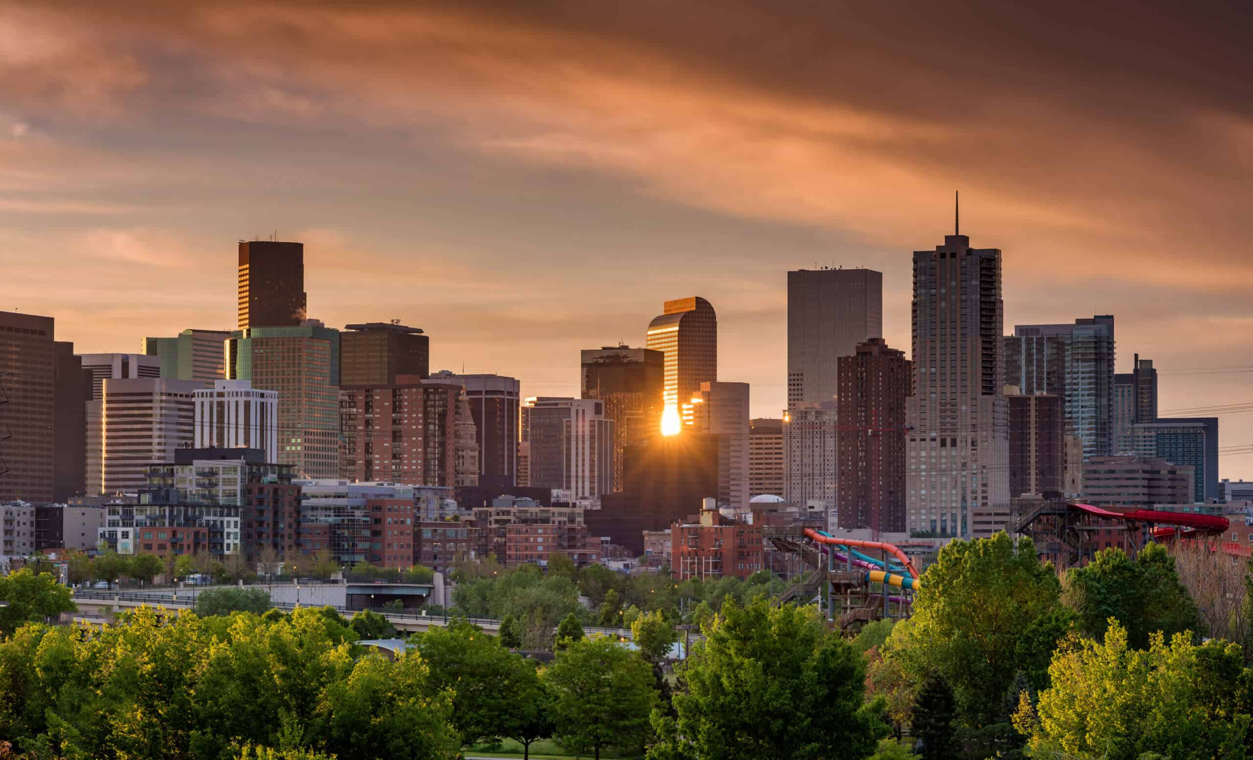 Denver Colorado skyline with sun star reflection